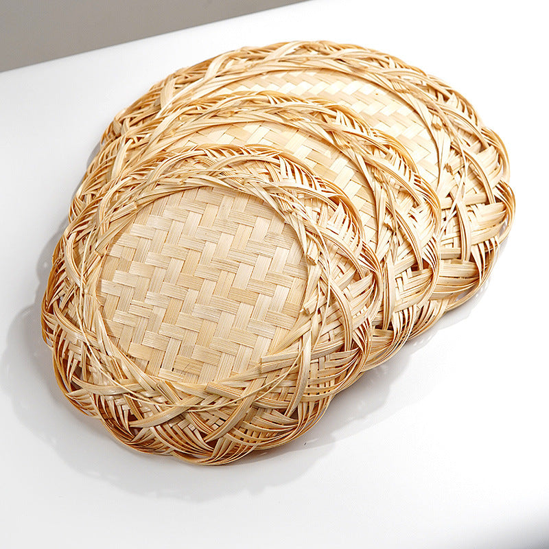 A three-piece set of rattan trays: large, medium, and small – a poetic interweaving of nature and life