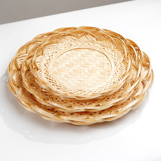 A three-piece set of rattan trays: large, medium, and small – a poetic interweaving of nature and life